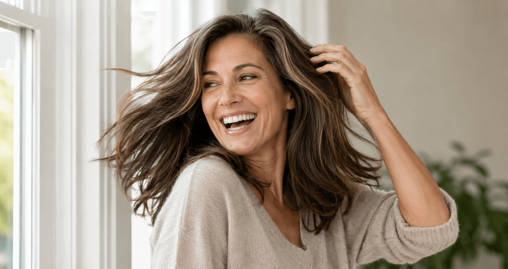 Woman over 40 with fuller-looking, healthy hair